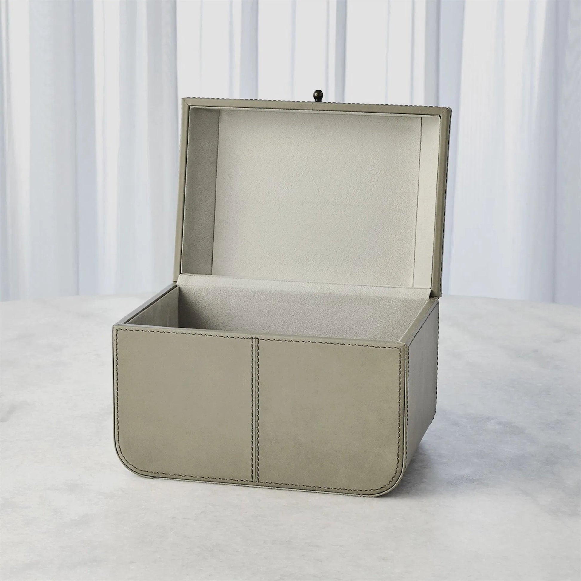 Curved Corner Box by Global Views. Made from mdf, leather, polysuede lining in a eclectic & global style.