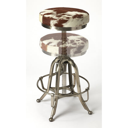 Donovan Hair-On-Hide Barstool by Butler Specialty Company in multi-color and hair-on-hide. Made from iron (silver finish), hair-on-hide, urethane foam (1.75lb. density) in a modern style.