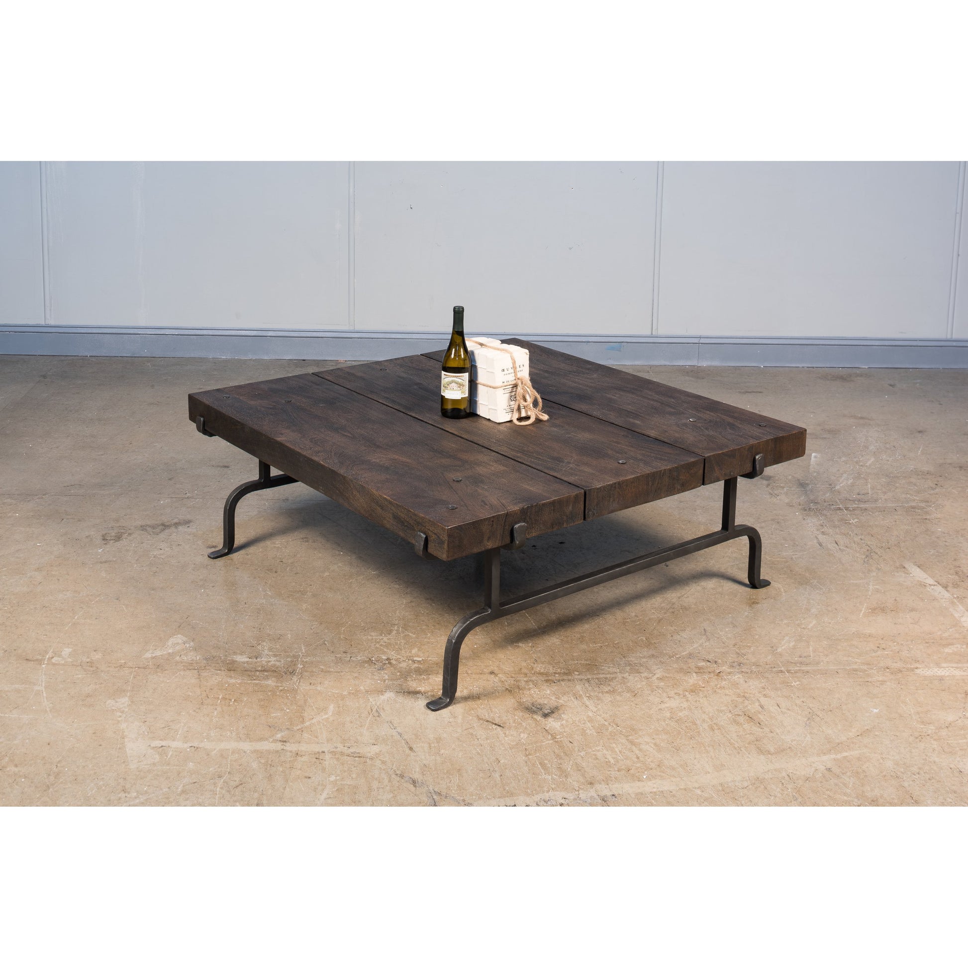 Blayne Square Coffee Table by Sarreid Ltd. in brown and heavy wrought iron base. Made from solid mango wood, iron in a rustic style.