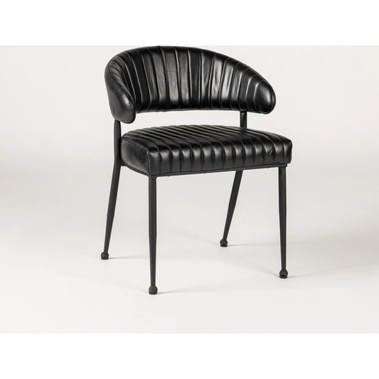 Umbria Dining Chair by Classic Home. Made from top grain leather, iron in a transitional style.