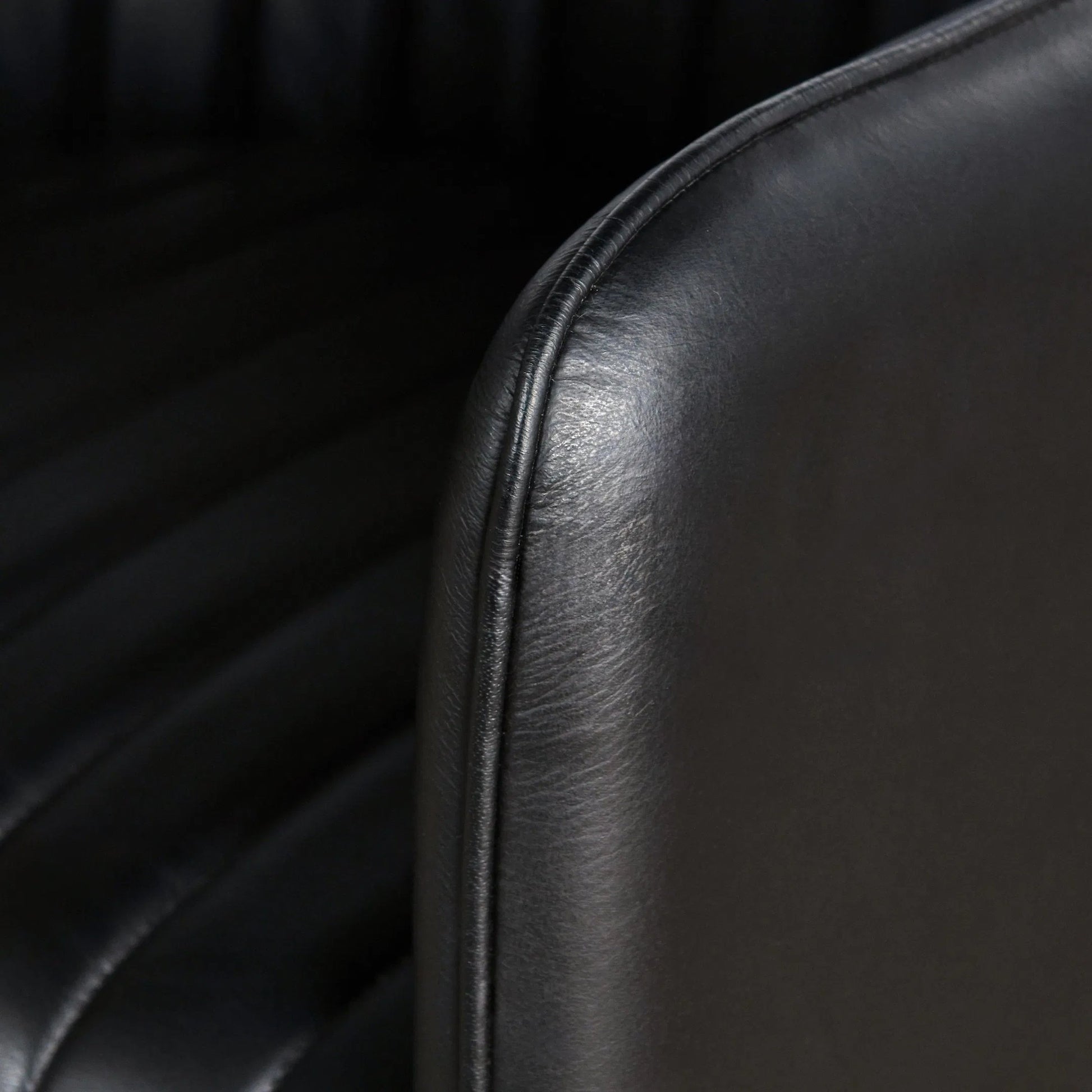 Leon Leather Dining Chair by Classic Home in jet black. Made from top grain buffalo leather in a modern style.