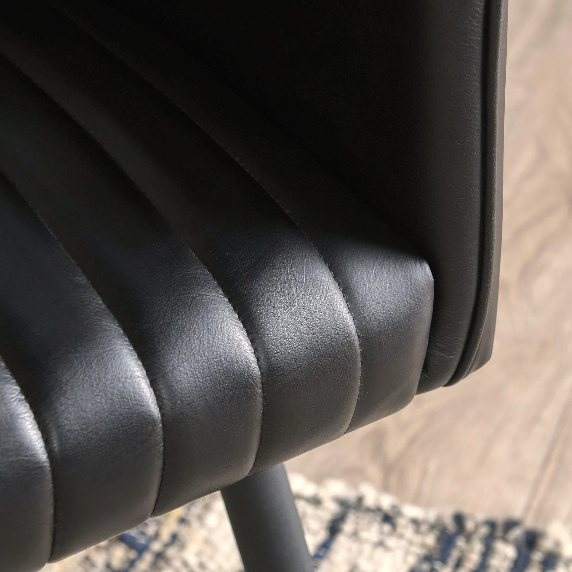 Leon Leather Dining Chair by Classic Home in jet black. Made from top grain buffalo leather in a modern style.
