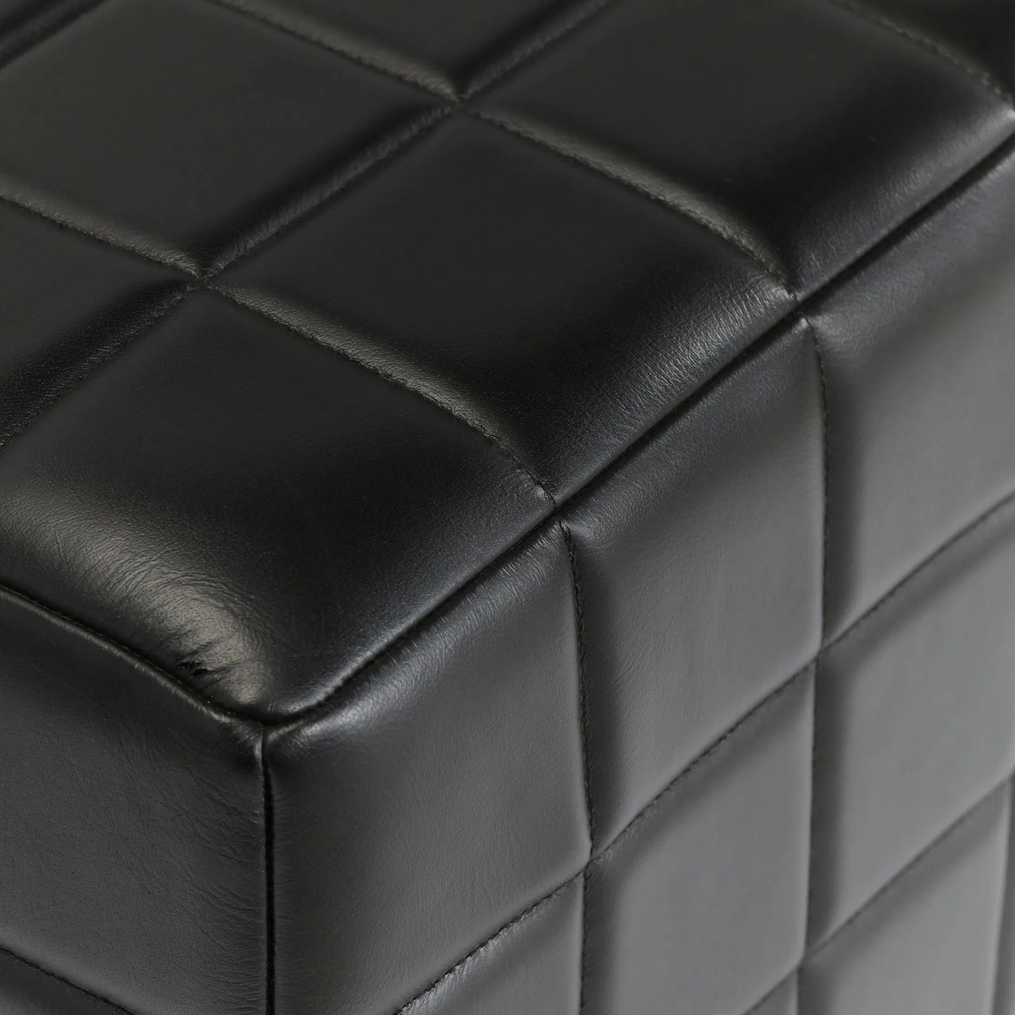 003 SI-2238876 | Closeup | Briar 18" Square Tufted Leather Ottoman by Classic Home in black. Made from top grain leather, mango wood in a modern style.