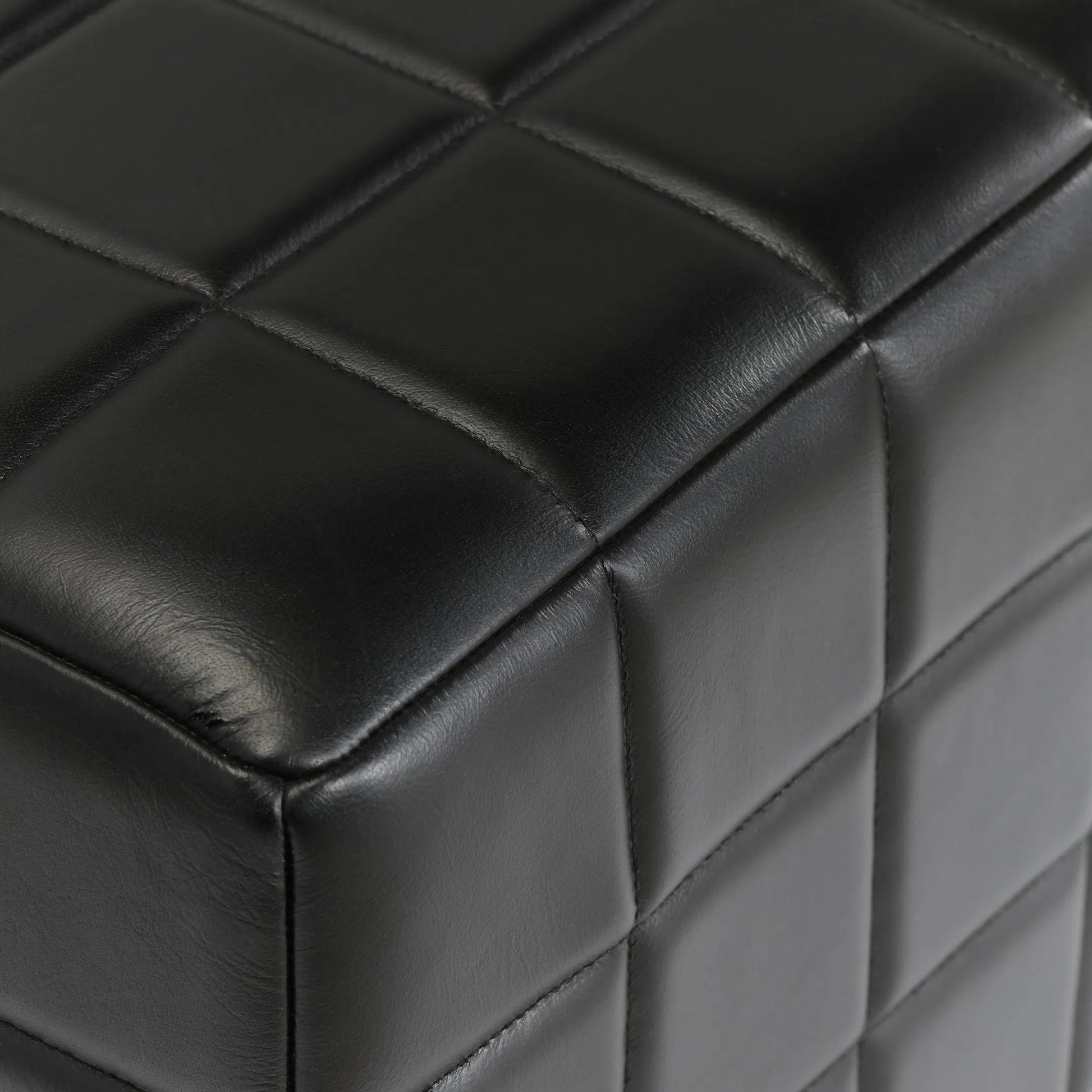 Briar 18" Square Tufted Leather Ottoman by Classic Home in black. Made from top grain leather, mango wood in a modern style.