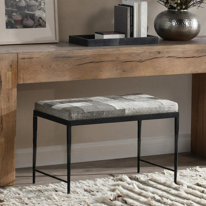 Achen Leather Hide Ottoman Bench by Classic Home. Made from hair on hide, iron in a transitional style.