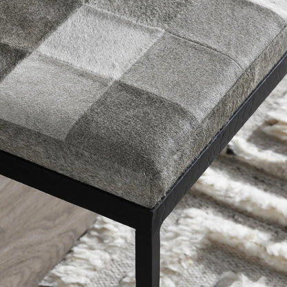 Achen Leather Hide Ottoman Bench by Classic Home. Made from hair on hide, iron in a transitional style.