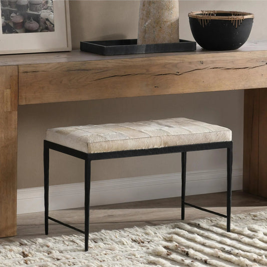 Achen Leather Hide Ottoman Bench by Classic Home. Made from hair on hide, iron in a unique style.