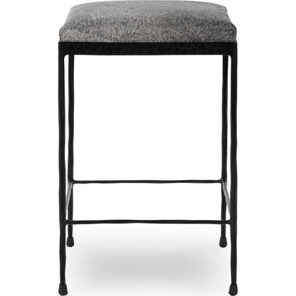 Bose Hide Leather Counter Stool by Classic Home. Made from embossed hammered iron, hair on hide in a modern style.