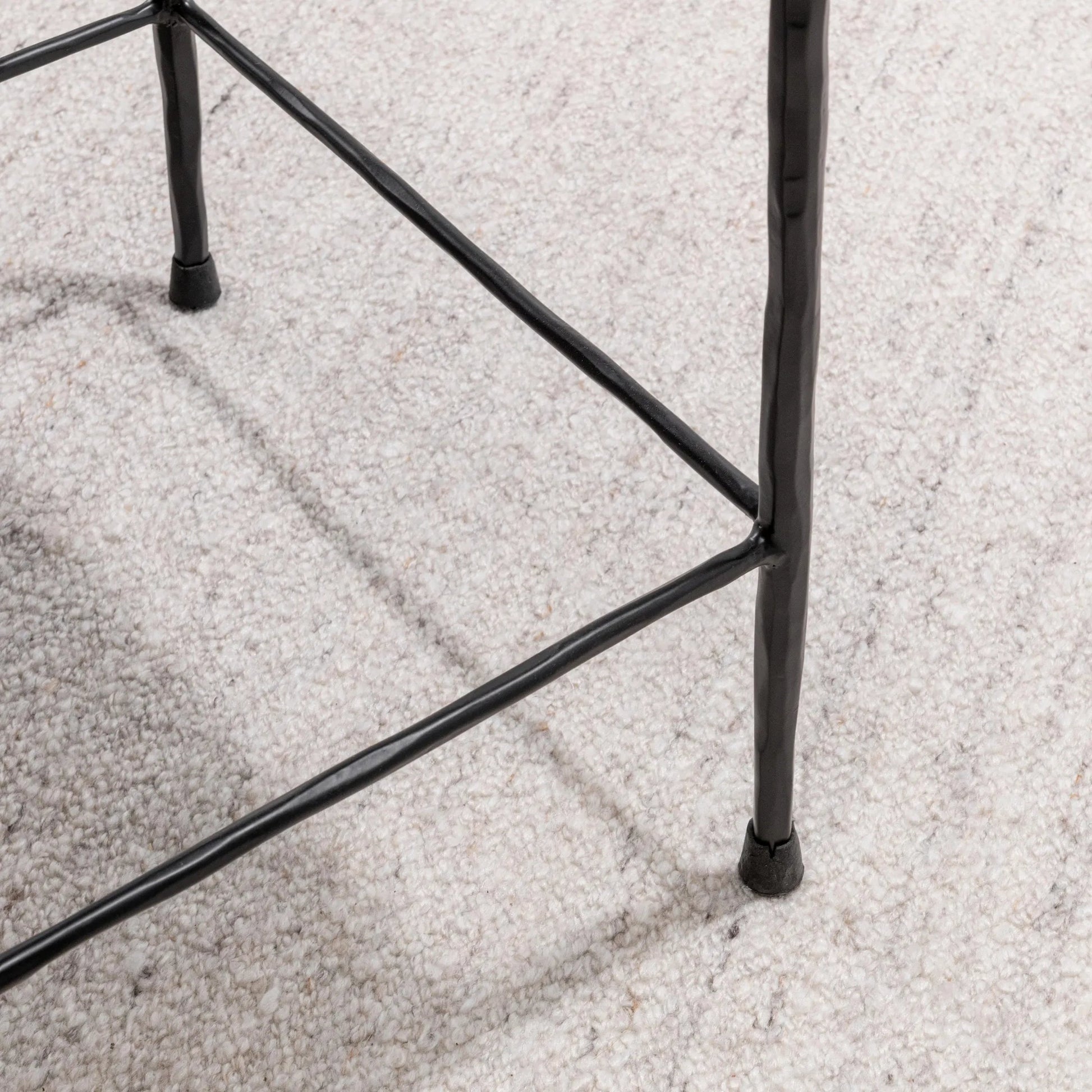Bose Hide Leather Counter Stool by Classic Home. Made from embossed hammered iron, hair on hide in a modern style.