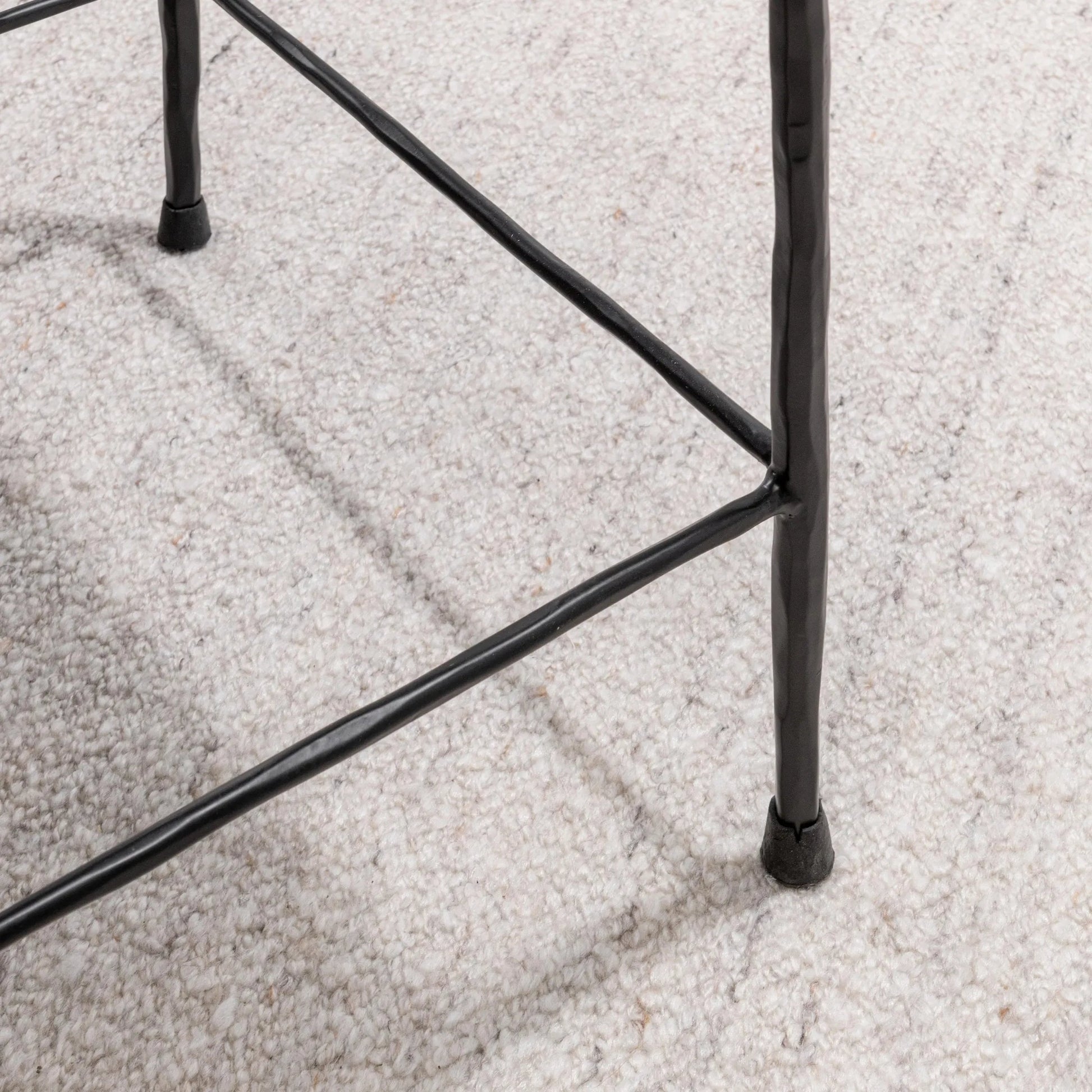 Bose Hide Leather Counter Stool by Classic Home. Made from embossed hammered iron, hair on hide in a modern style.