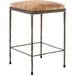Bose Hide Leather Counter Stool by Classic Home. Made from embossed hammered iron, hair on hide in a modern style.