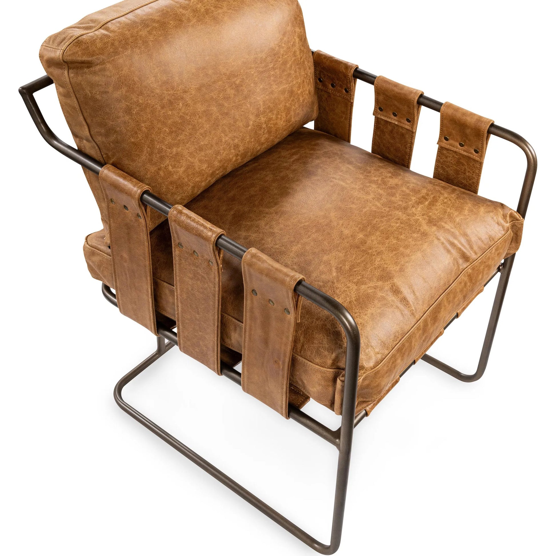 Strapling Leather Dining Chair by Classic Home. Made from top grain leather, iron in a traditional style.