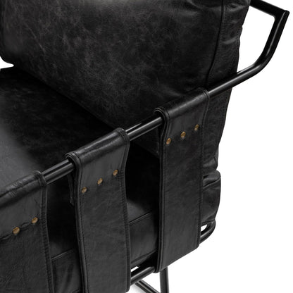 Strapling Leather Dining Chair by Classic Home. Made from top grain leather, iron in a traditional style.