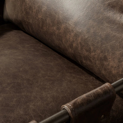 Strapling Leather Dining Chair by Classic Home. Made from top grain leather, iron in a traditional style.