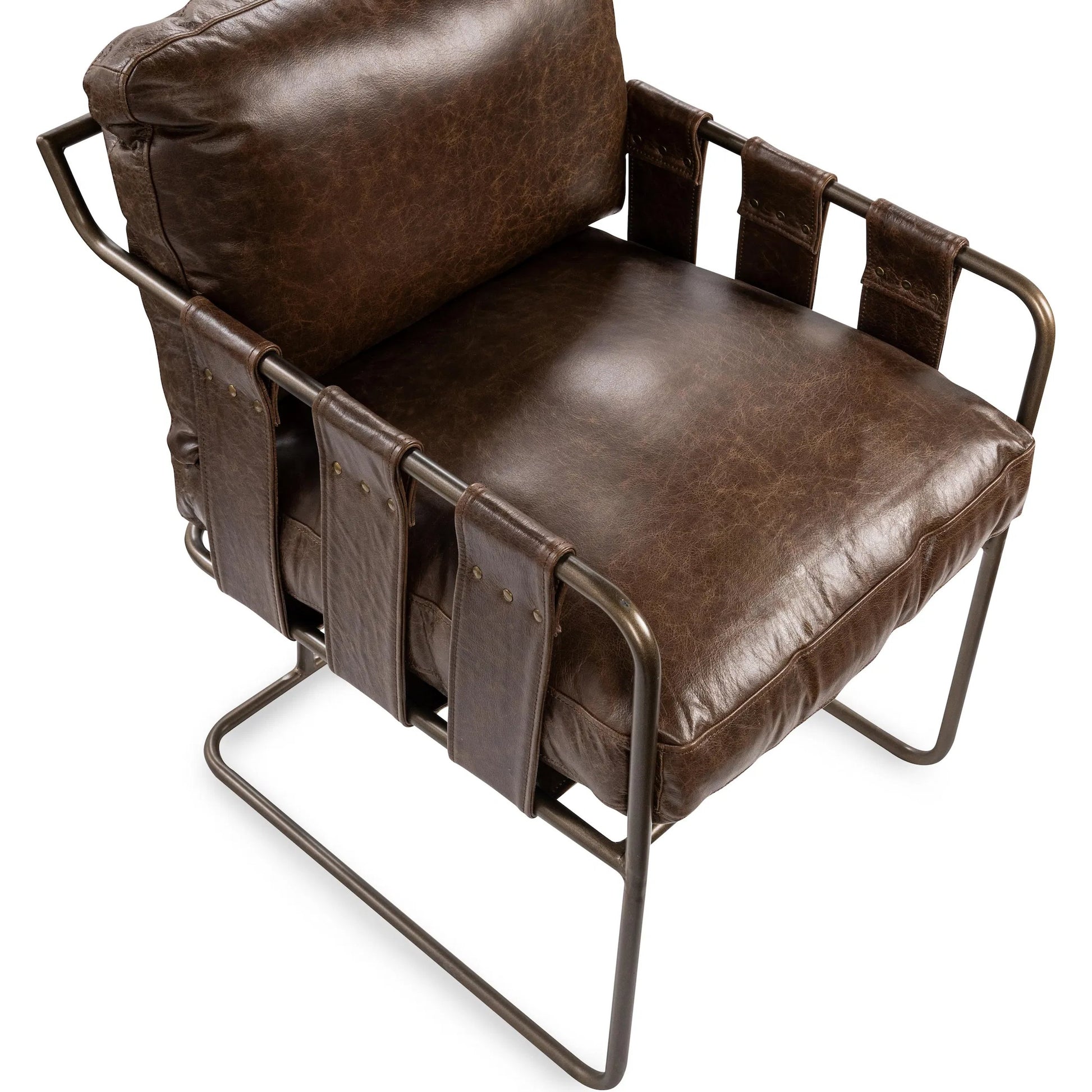 Strapling Leather Dining Chair by Classic Home. Made from top grain leather, iron in a traditional style.
