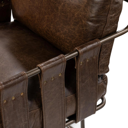 Strapling Leather Dining Chair by Classic Home. Made from top grain leather, iron in a traditional style.
