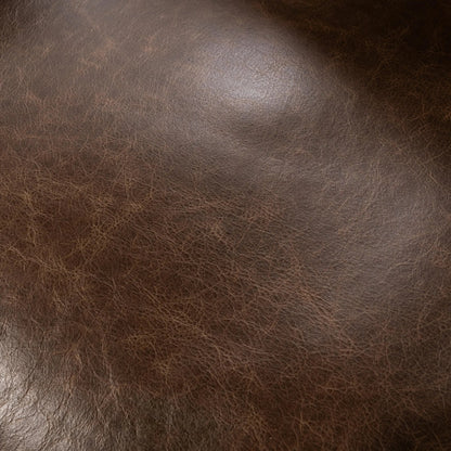 Strapling Leather Dining Chair by Classic Home. Made from top grain leather, iron in a traditional style.