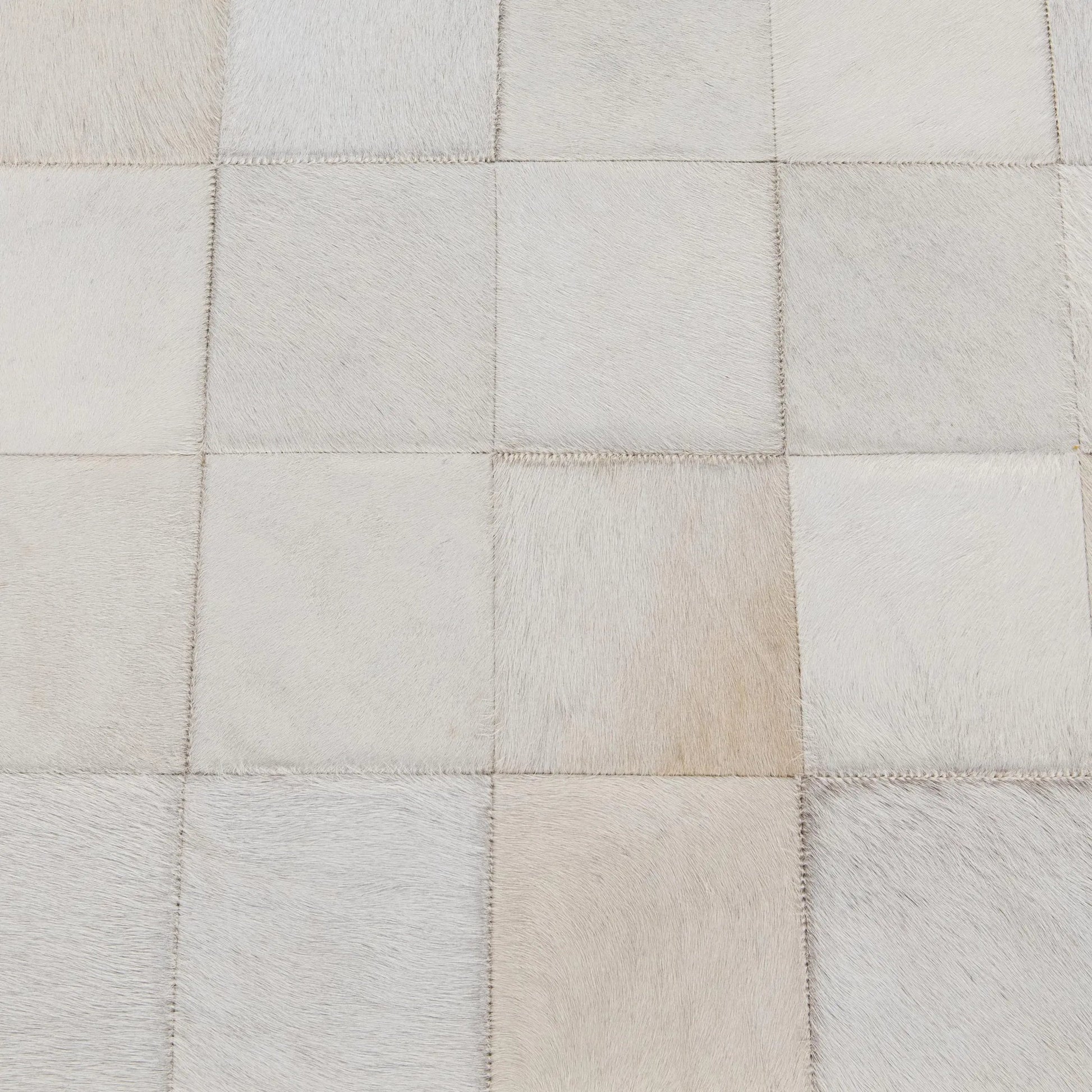 Achen Hair on Hide Bench by Classic Home. Made from hair on hide, iron in a transitional style.