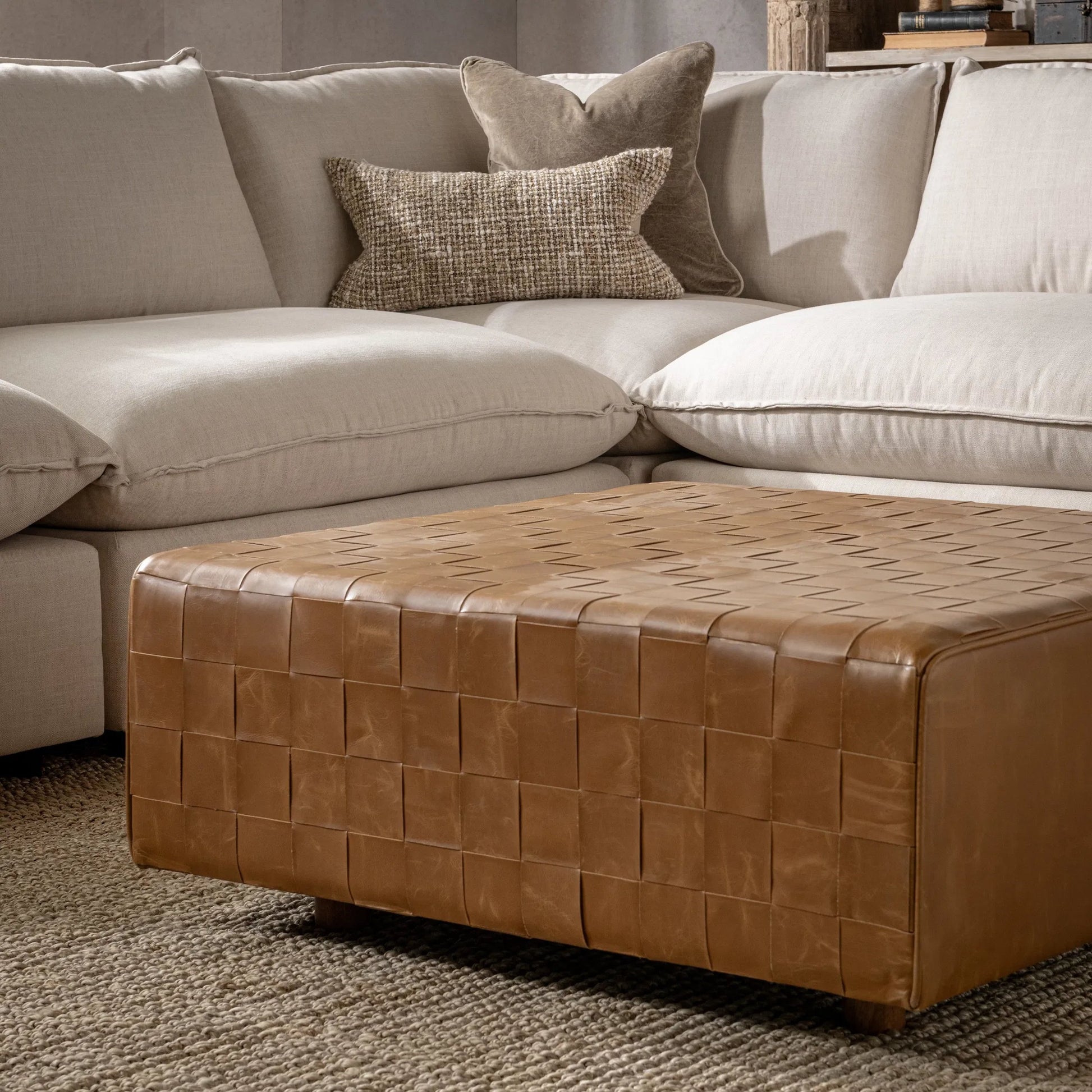 Aristo Leather Square Cocktail Ottoman by Classic Home in autum maple. Made from leather, mango wood, plywood in a rustic style.