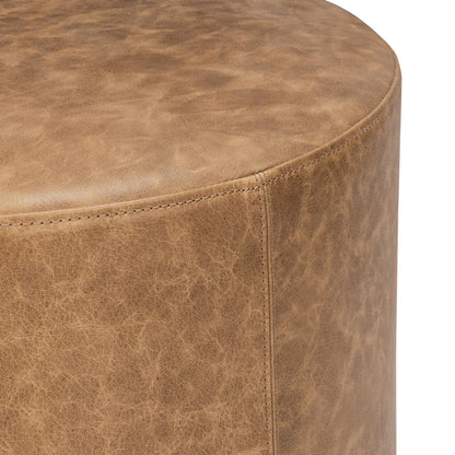 Millo Round Ottoman by Classic Home in sedona brown. Made from top grain leather in a unique style.