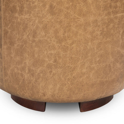 Millo Round Ottoman by Classic Home in sedona brown. Made from top grain leather in a unique style.