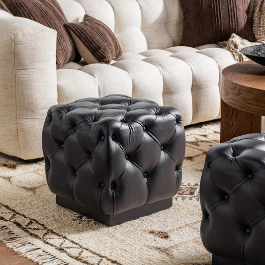 Briar Ottoman by Classic Home in midnight raven. Made from top grain leather in a unique style.