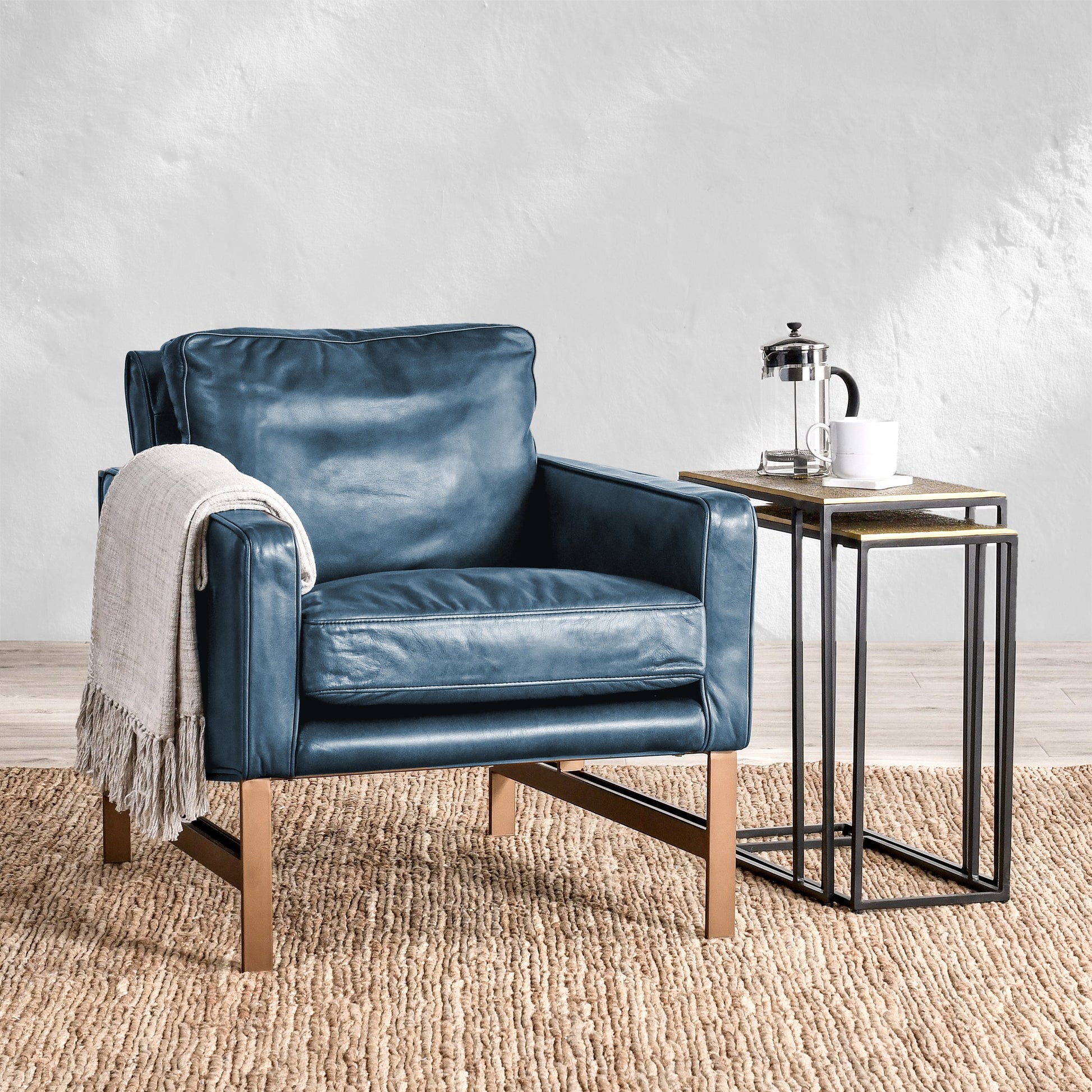 Chad Club Chair by Classic Home. Made from top grain leather, iron in a modern style.