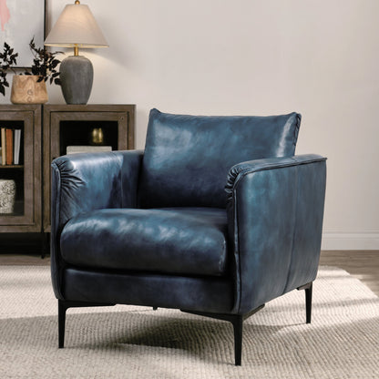 Corinne Club Chair Ocean Blue by Classic Home in ocean blue. Made from buffalo leather, tube iron, plywood, solid wood in a transitional style.