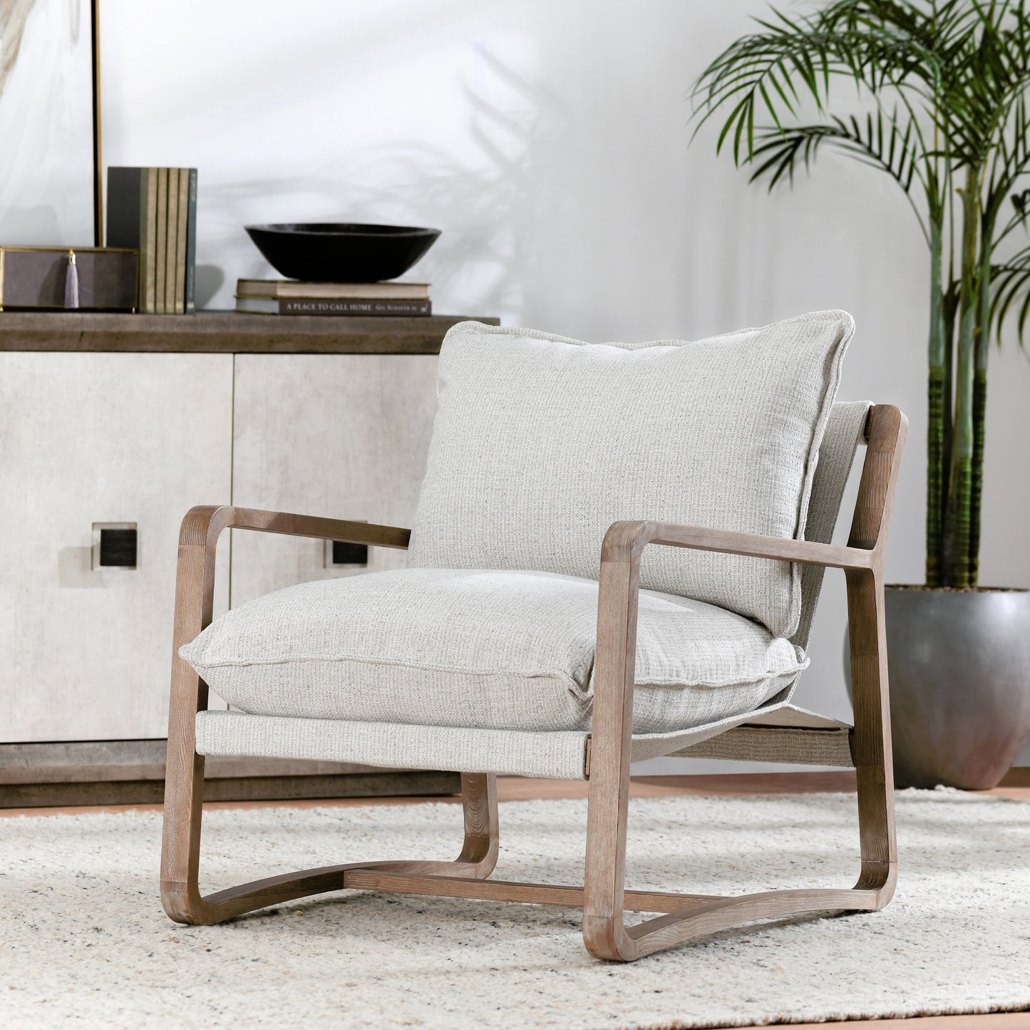 008 SI-2162621 | Lifestyle | Mariah Accent Chair Natural by Classic Home in beige. Made from solid ash, 95% polyester, 5% polyester in a modern style.