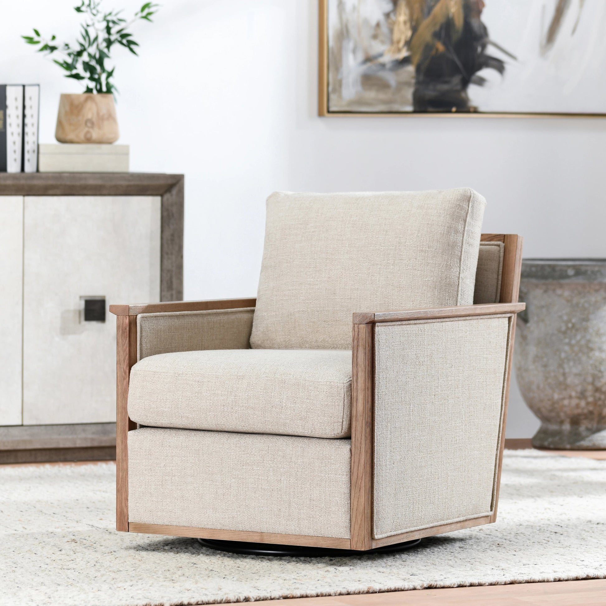 Norman Swivel Accent Chair by Classic Home in natural. Made from ash wood, 88% polyester, 12% linen in a modern style.