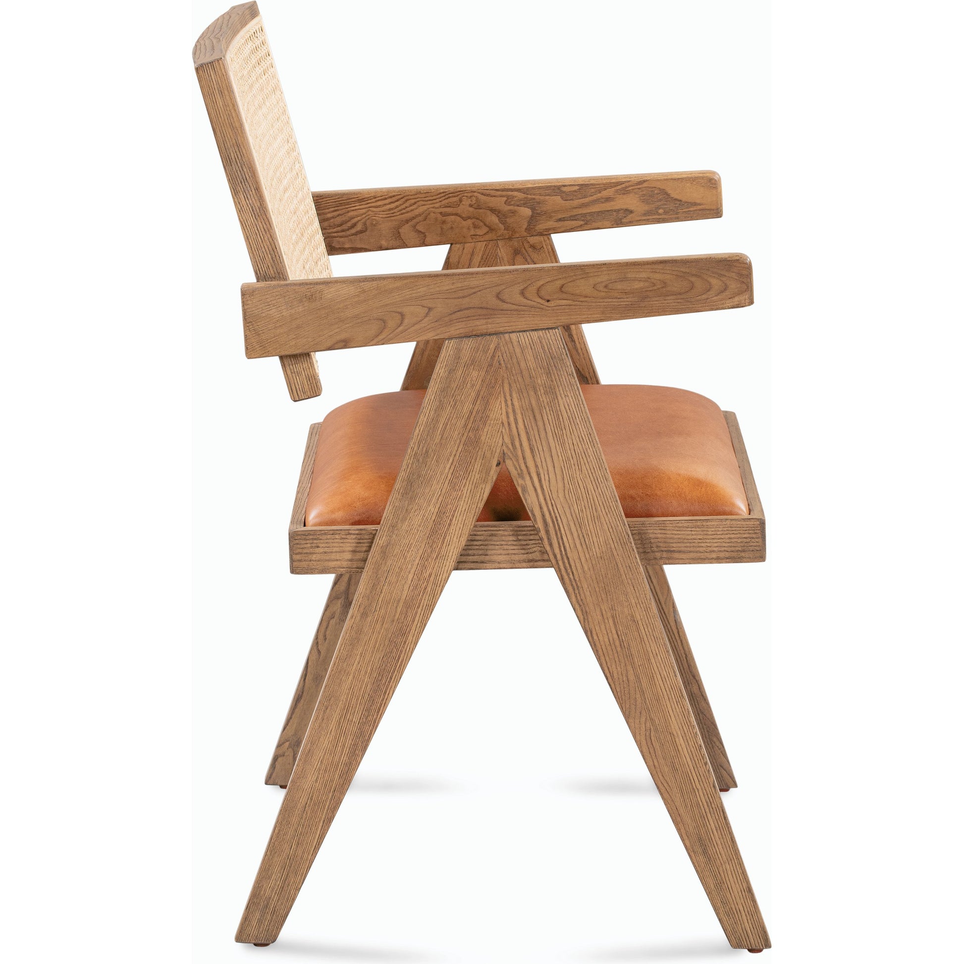 Douglas Top-Grain Leather & Rattan Dining Chair by Classic Home in tan. Made from ash wood, top-grain leather, rattan in a transitional style.