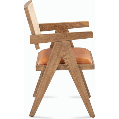 Douglas Top-Grain Leather & Rattan Dining Chair by Classic Home in tan. Made from ash wood, top-grain leather, rattan in a transitional style.