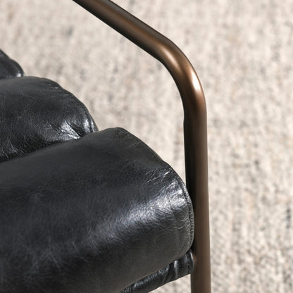 Argo Top Grain Leather Black Accent Chair by Classic Home in black. Made from top grain leather, iron in a modern style.