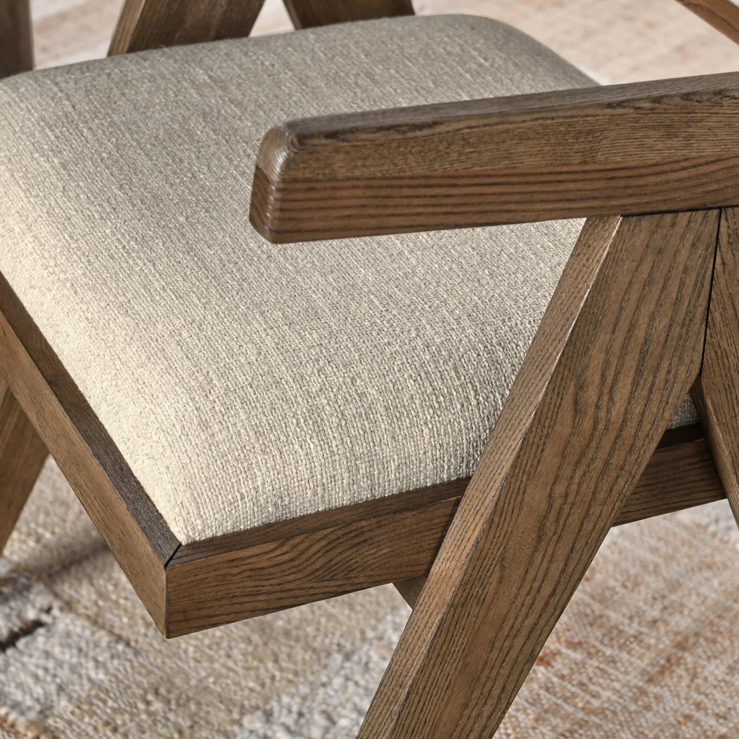 005 SI-2238902 | Closeup | Dolton Dining Arm Chair by Classic Home in beige, natural. Made from 88% polyester, 12% linen, ash wood in a transitional style.