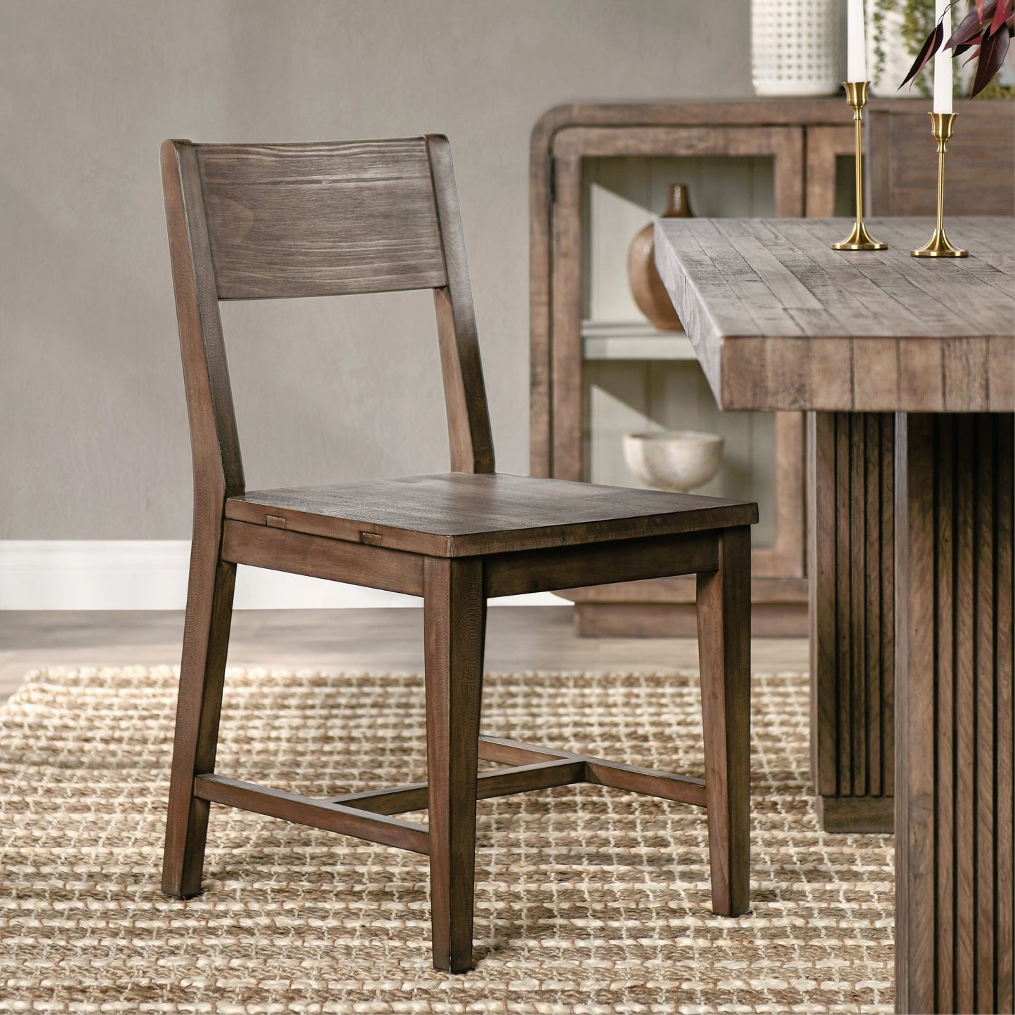 008 SI-2162639 | Lifestyle | Ollie Dining Chair by Kosas Home in brown. Made from reclaimed pine in a modern style.