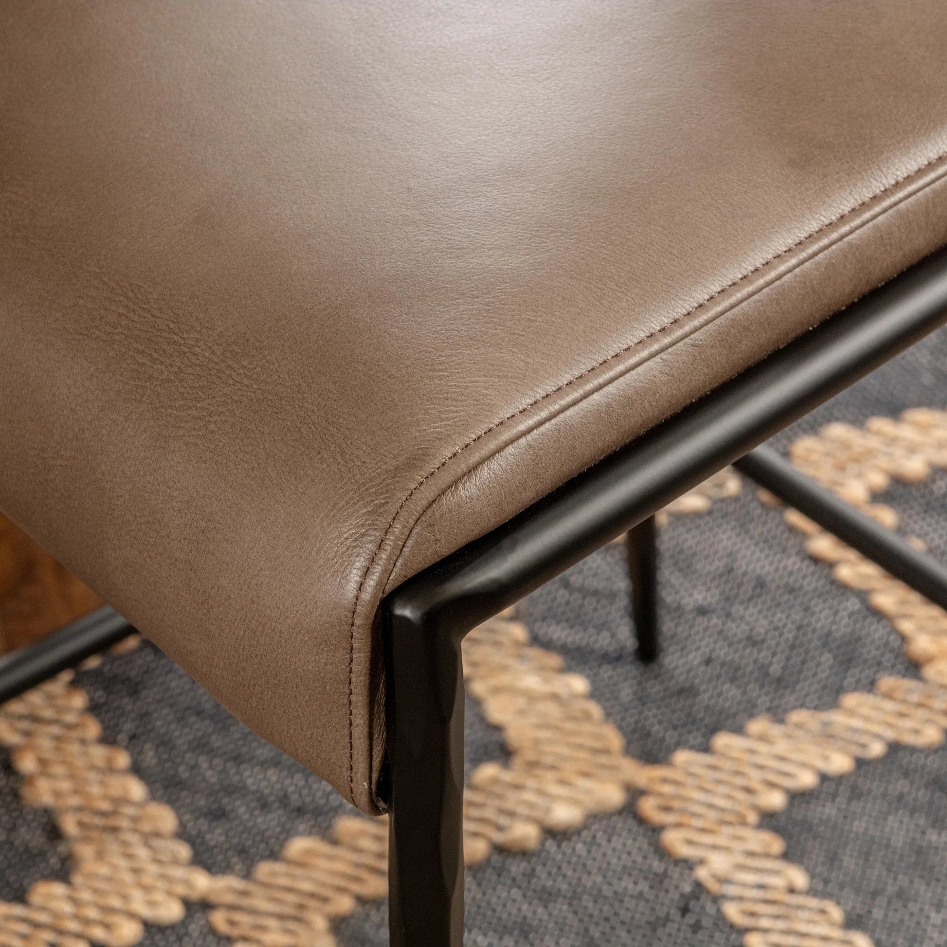 Kayne Leather Counter Stool by Classic Home. Made from top grain leather in a traditional style.