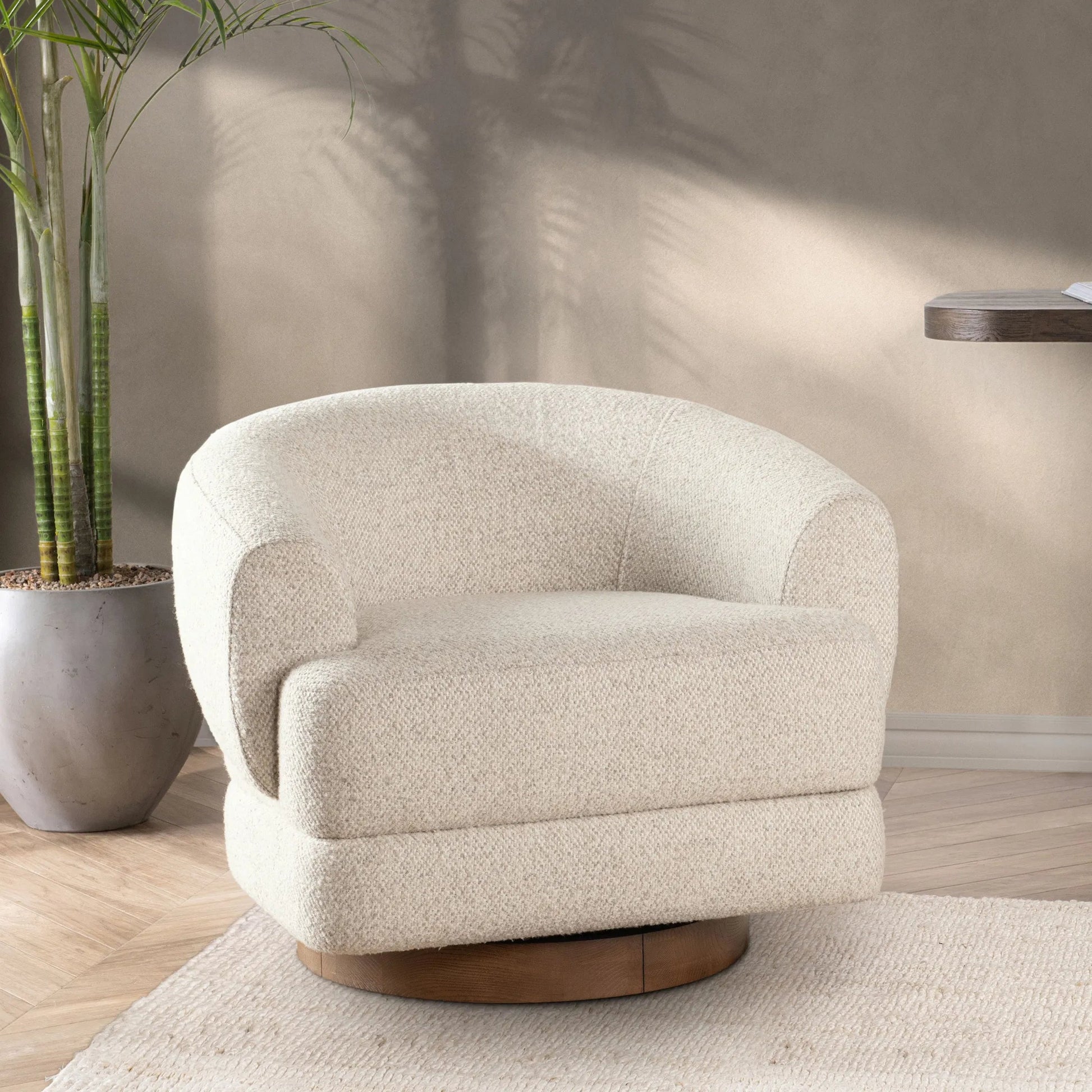 Chassia Upholstered Swivel Chair by Classic Home in beige. Made from 95% polyester, 5% wool, ash wood in a transitional style.