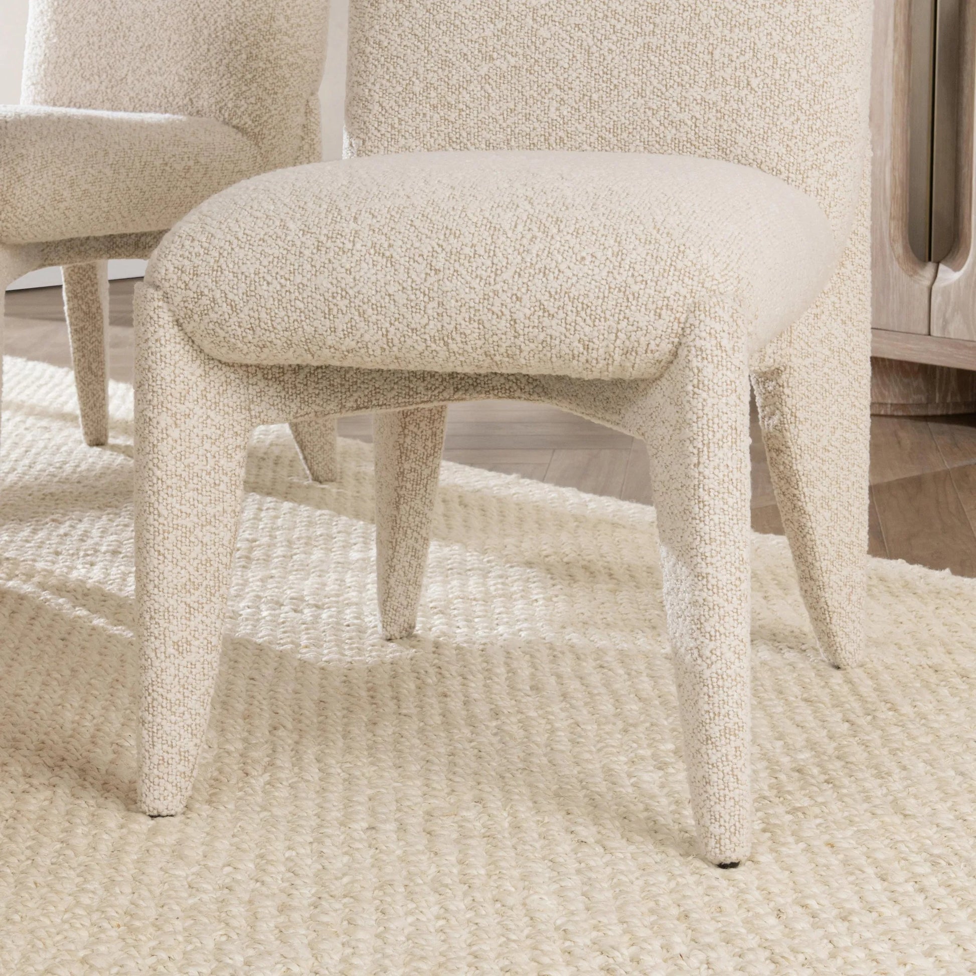 Danson Upholstered Dining Chair by Classic Home in ivory. Made from 100% polyester in a transitional style.