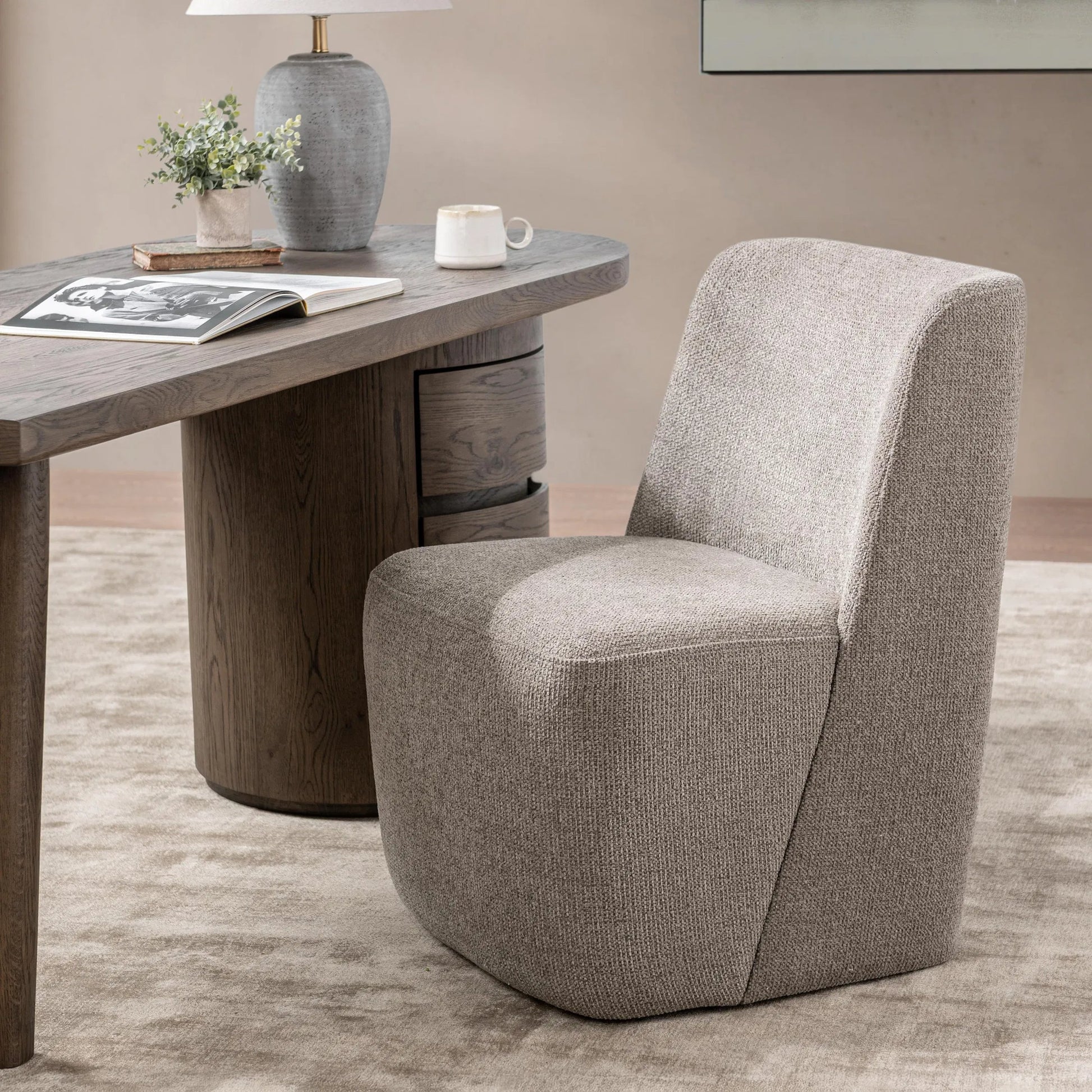 Senna Upholstered Dining Chair by Classic Home in taupe. Made from 100% polyester in a unique style.