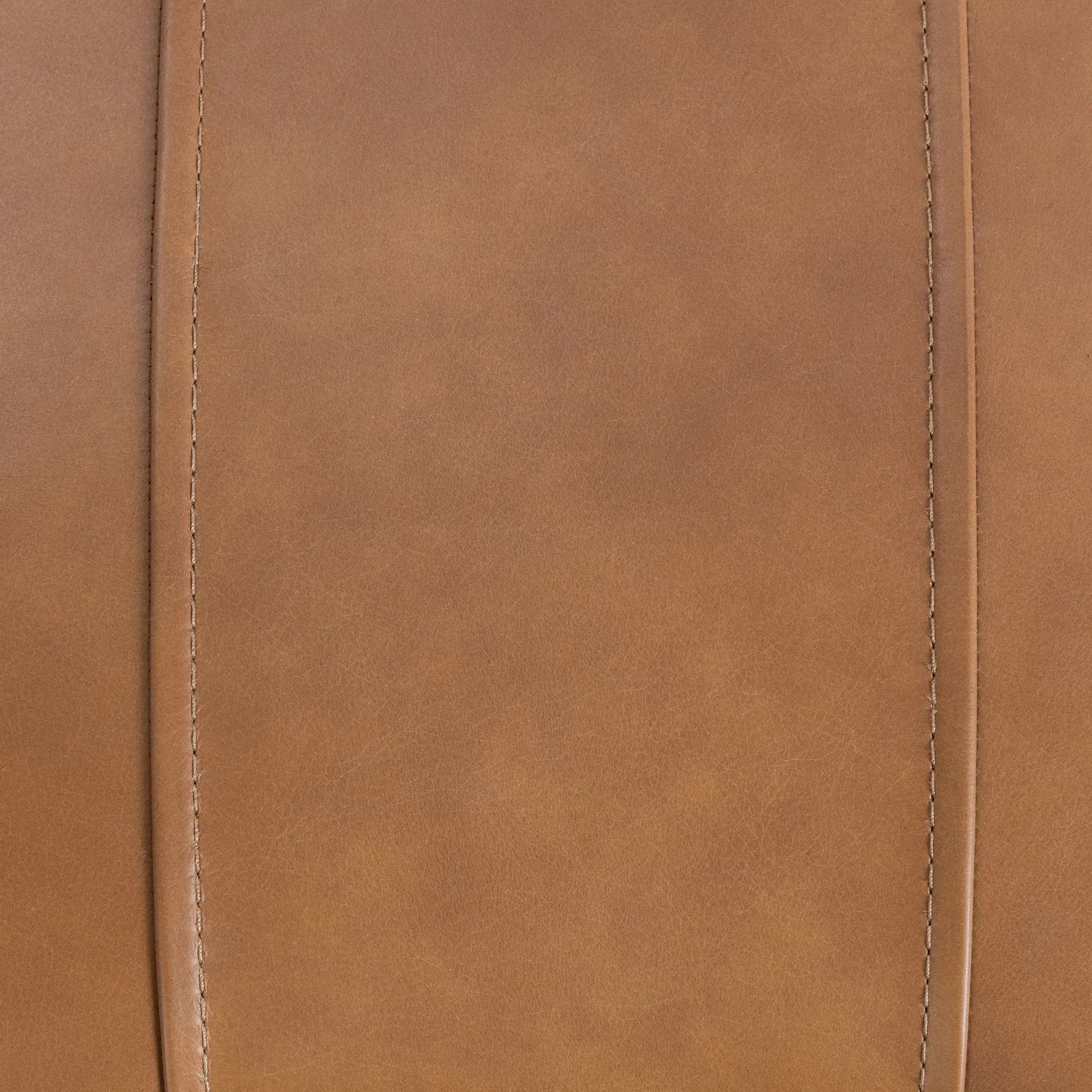 Liliana Dining Chair by Classic Home in tan. Made from top grain leather in a unique style.
