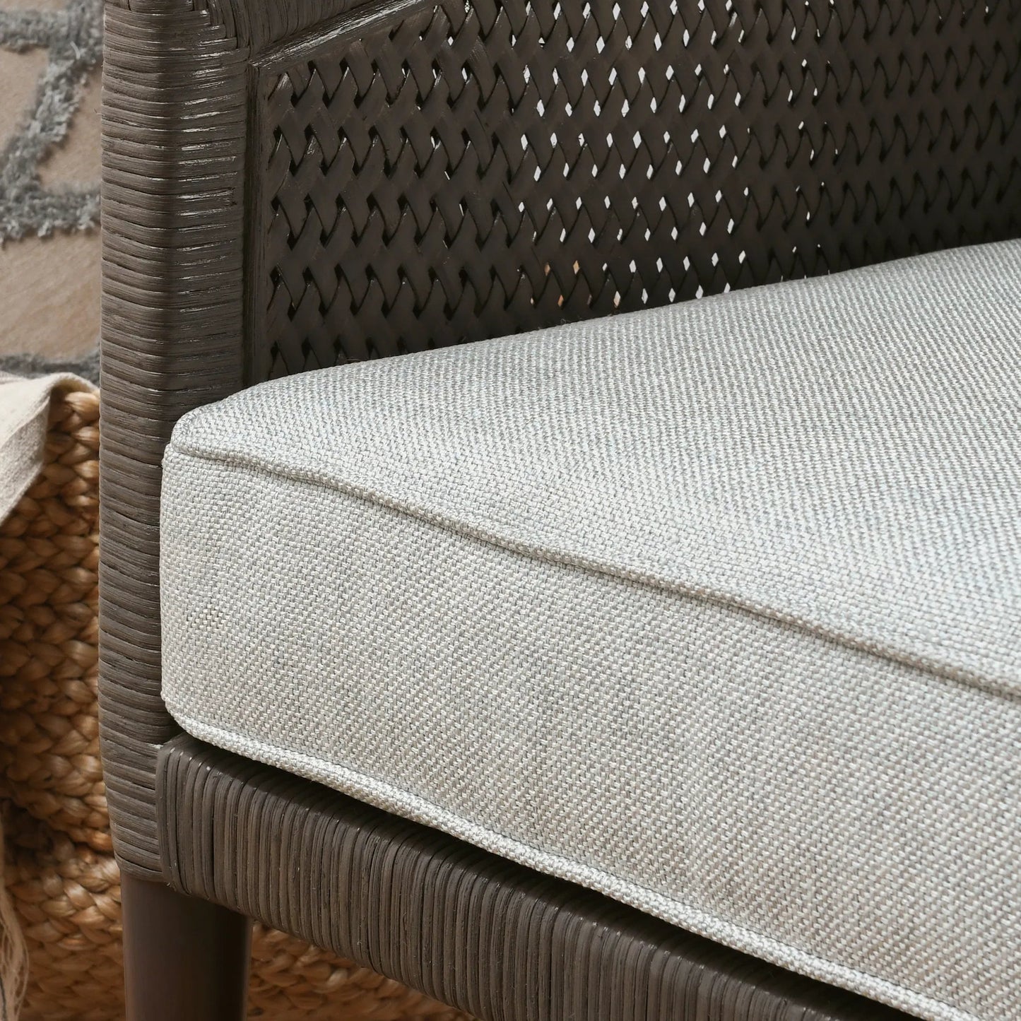 016 SI-2388557 | Closeup | Kaitlin Wicker Accent Chair by Classic Home in pearl gray. Made from wicker, rattan in a transitional style.