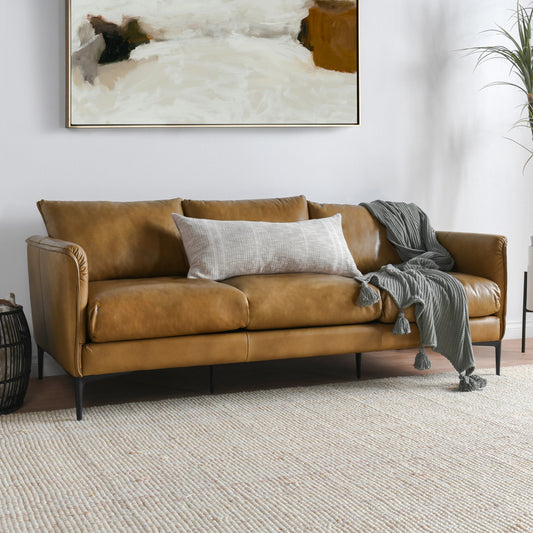 Ava Sofa by Classic Home in tan. Made from top grain leather, tube iron in a modern style.