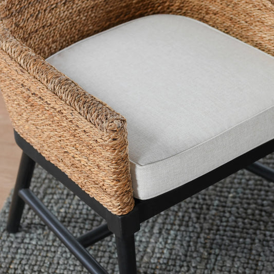 Rey Arm Chair by Kosas Home in wood. Made from mahogony wood, rattanpole, 100% polyester in a unique style.