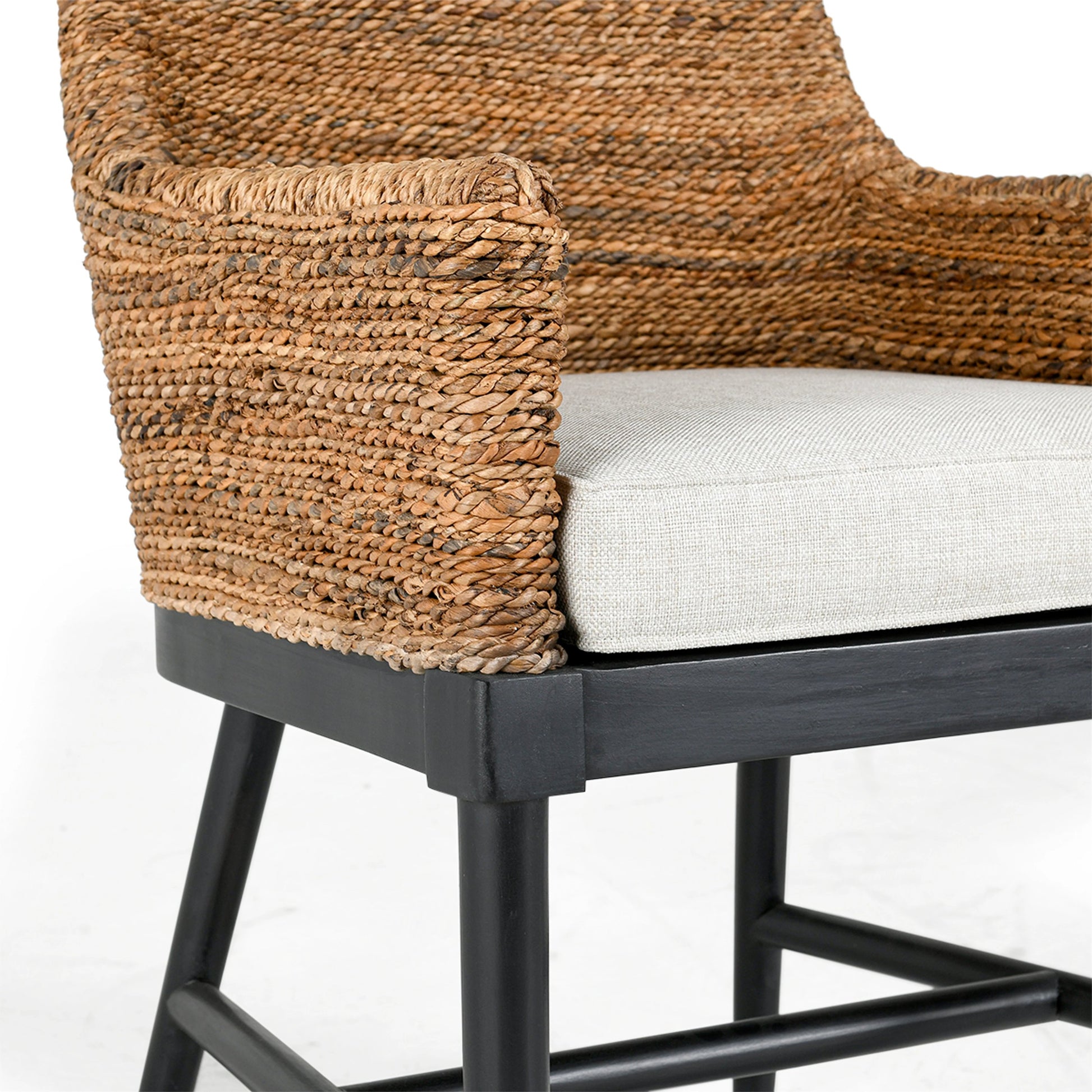 Rey Arm Chair by Kosas Home in wood. Made from mahogony wood, rattanpole, 100% polyester in a unique style.