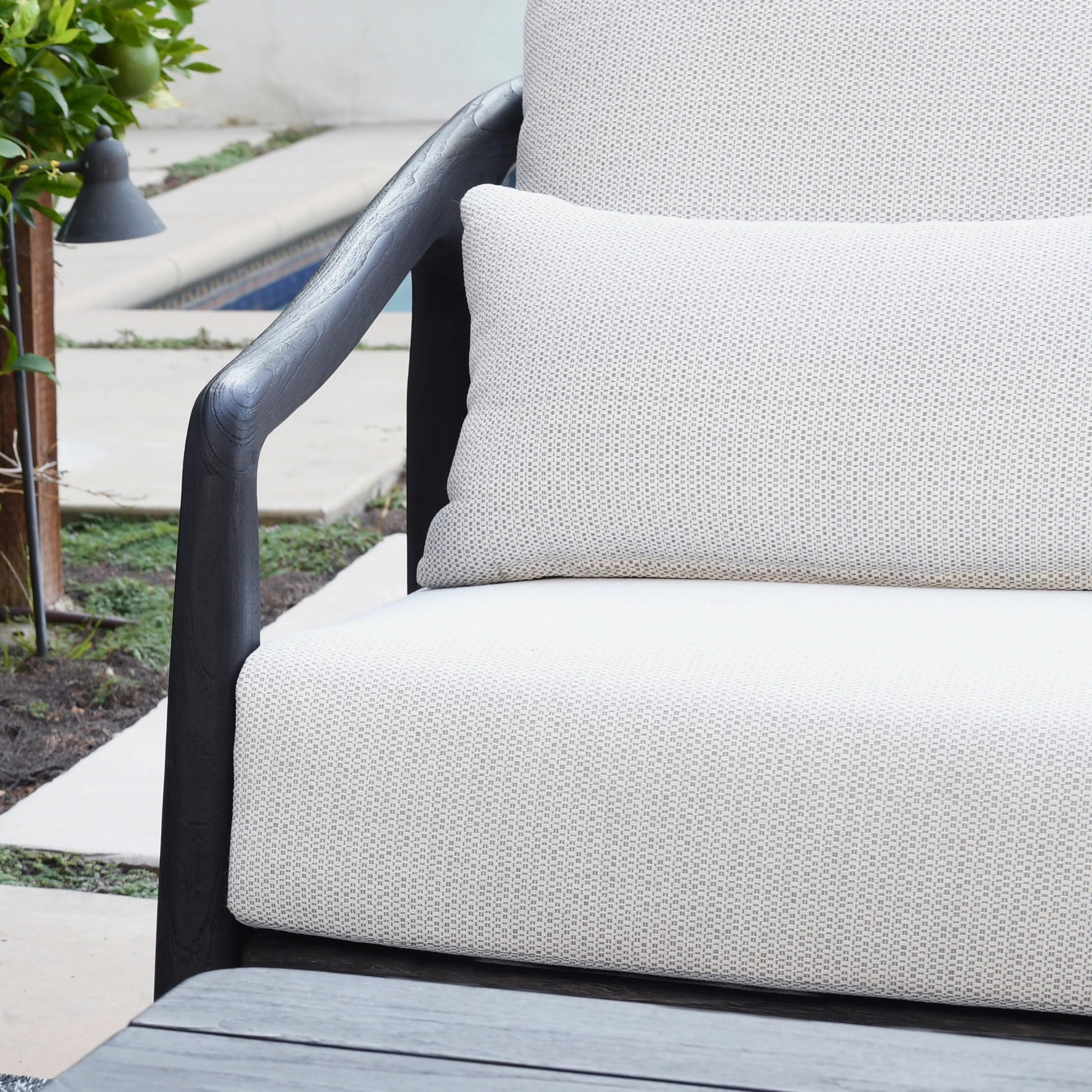 Aria Outdoor Sofa by Classic Home in cream, black. Made from teak wood, wicker, 100% olefin in a modern style.