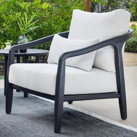 Aria Outdoor Accent Chair by Classic Home in cream, black. Made from teak wood, wicker, 100% olefin in a modern style.