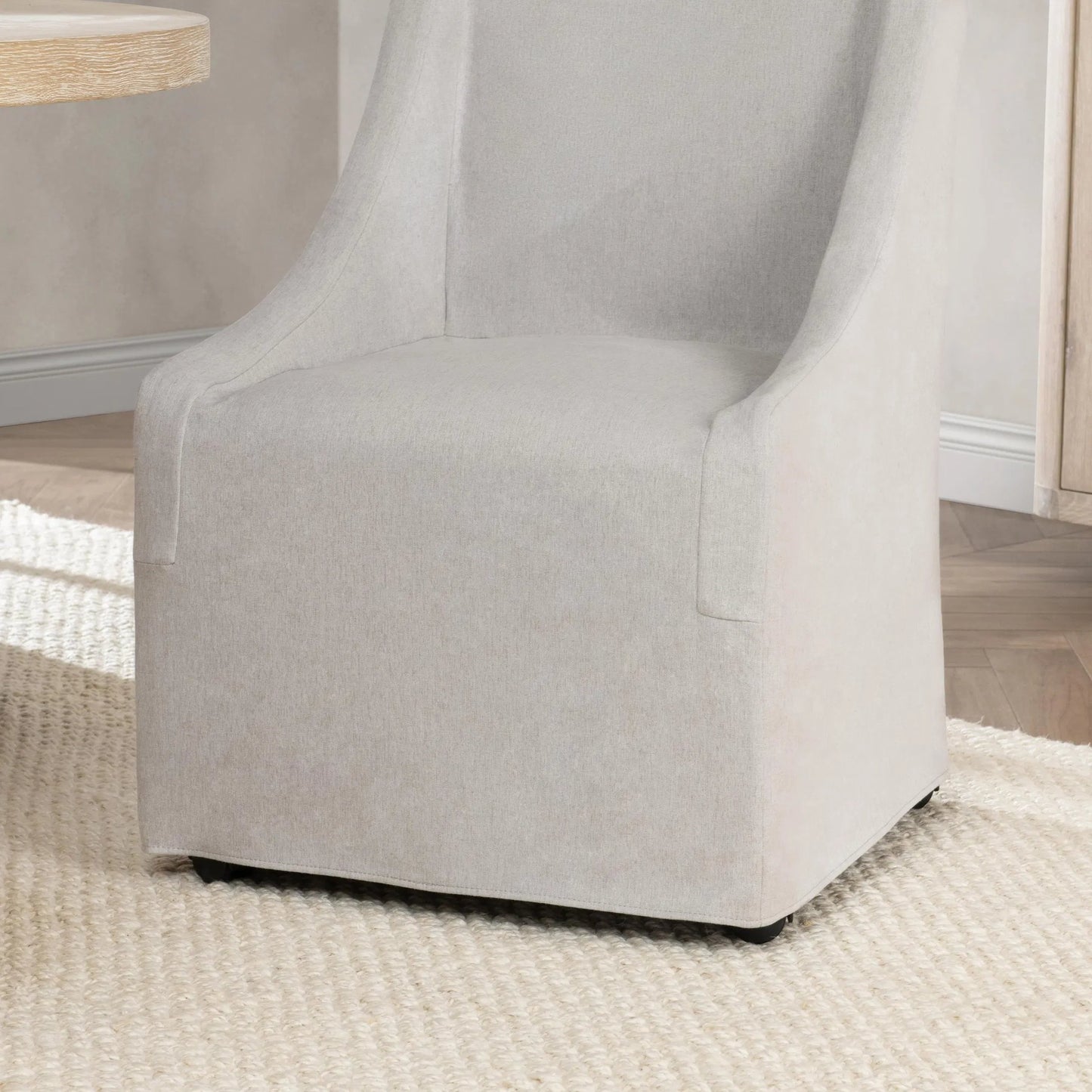 004 SI-2303344 | Closeup | Warwick Upholstered Rolling Dining Chair by Classic Home. Made from 100% polyester in a transitional style.