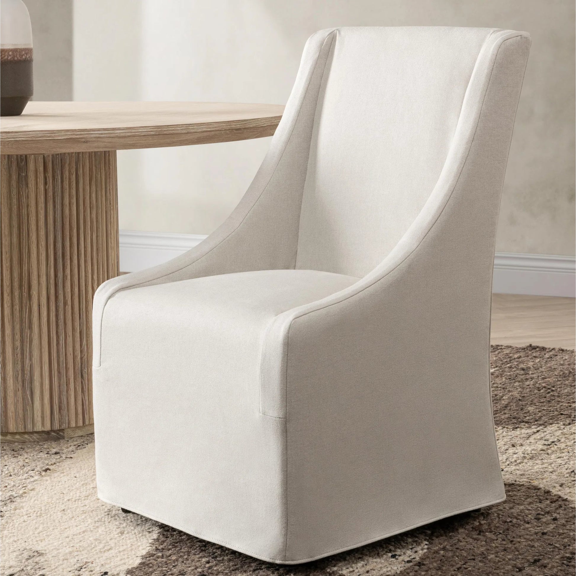 Warwick Upholstered Rolling Dining Chair by Classic Home. Made from 100% polyester in a unique style.