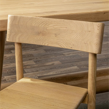 Foundation Oak Wood Counter Height Chair by Classic Home. Made from oak wood in a transitional style.