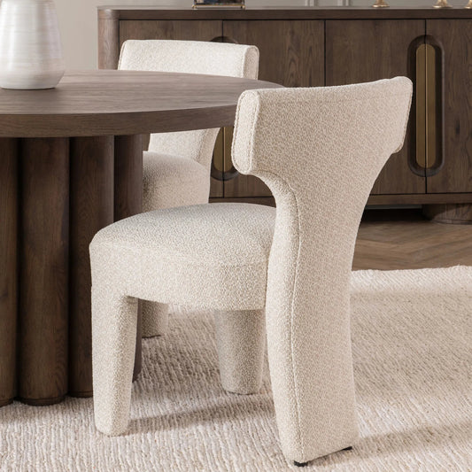 Khai Upholstered Dining Chair by Classic Home. Made from 100% polyester in a transitional style.
